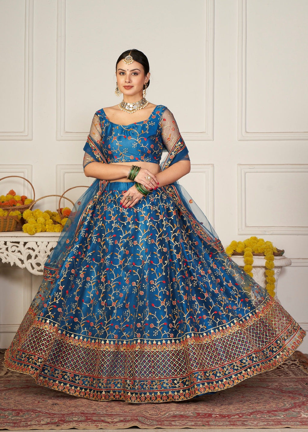 Elegant Teal Blue Floral Embroidered Festive & Wedding Wear Semi-Stitched Net Lehenga Choli with Designer Border & Sleeve Work