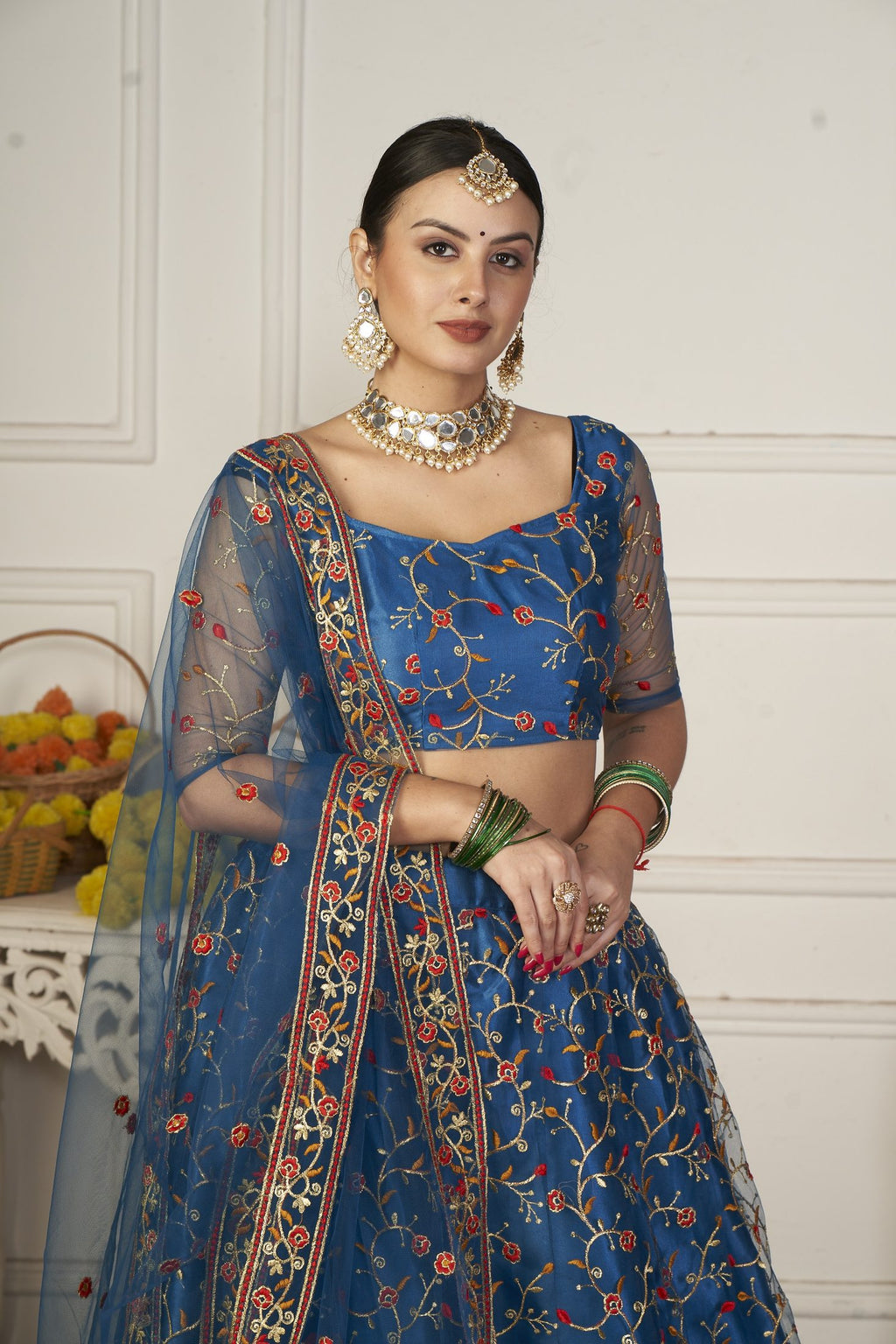 Elegant Teal Blue Floral Embroidered Festive & Wedding Wear Semi-Stitched Net Lehenga Choli with Designer Border & Sleeve Work