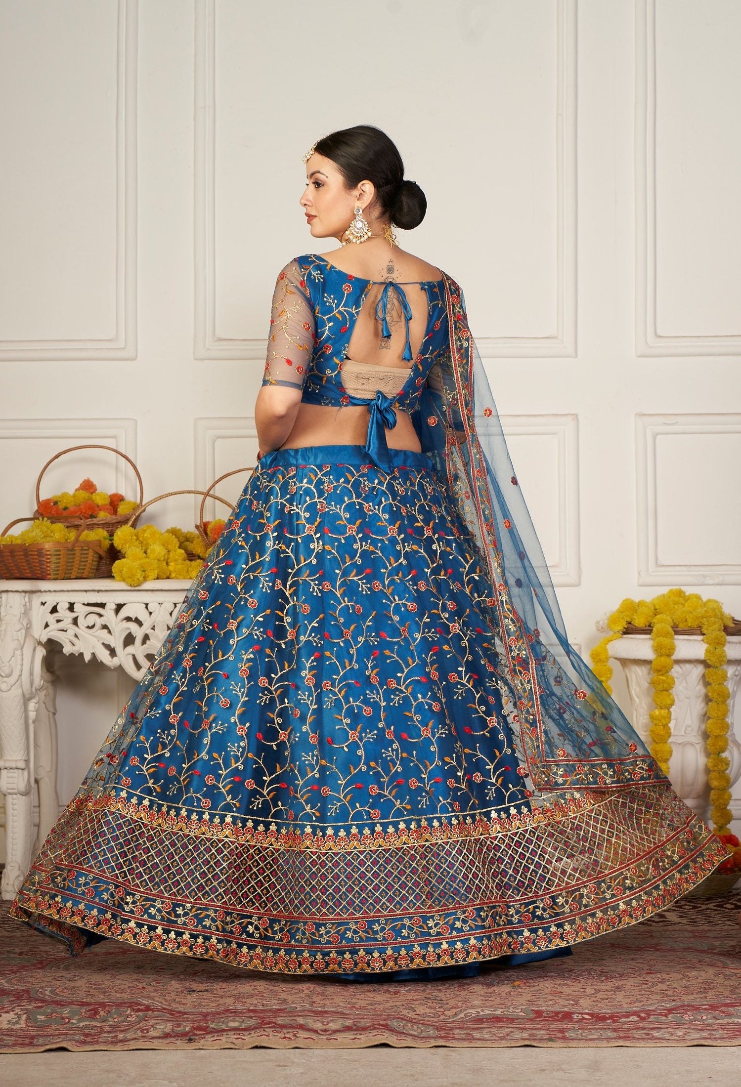 Elegant Teal Blue Floral Embroidered Festive & Wedding Wear Semi-Stitched Net Lehenga Choli with Designer Border & Sleeve Work
