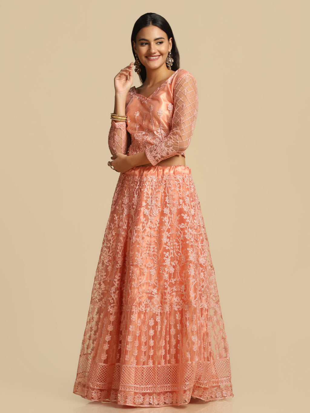 Elegant Peach Pink Festive & Wedding Wear Semi-Stitched Net Lehenga Choli with Floral Embroidery Pattern