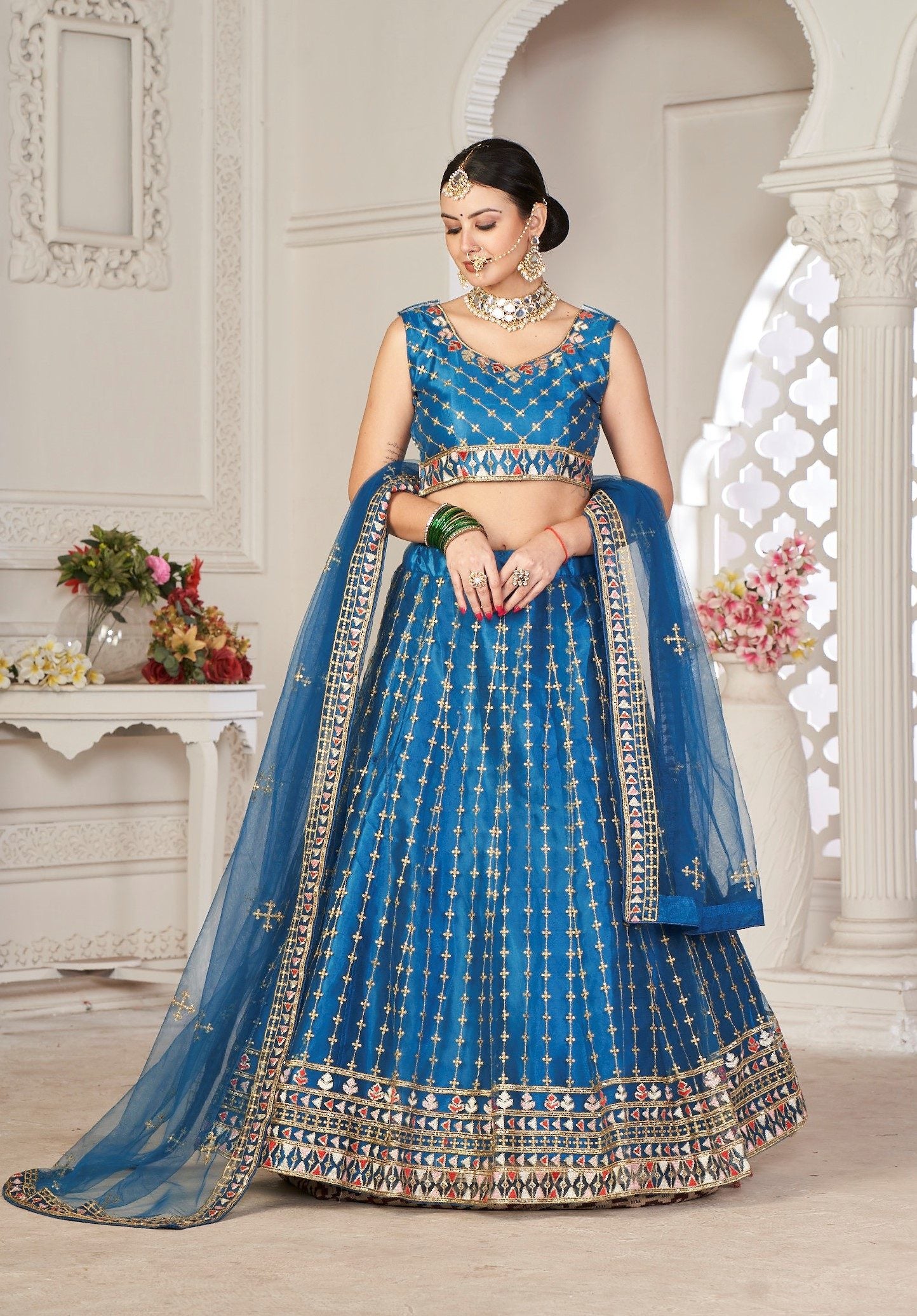 Graceful Teal Blue Embroidered Festive & Wedding Wear Semi-Stitched Net Lehenga Choli with Net Dupatta