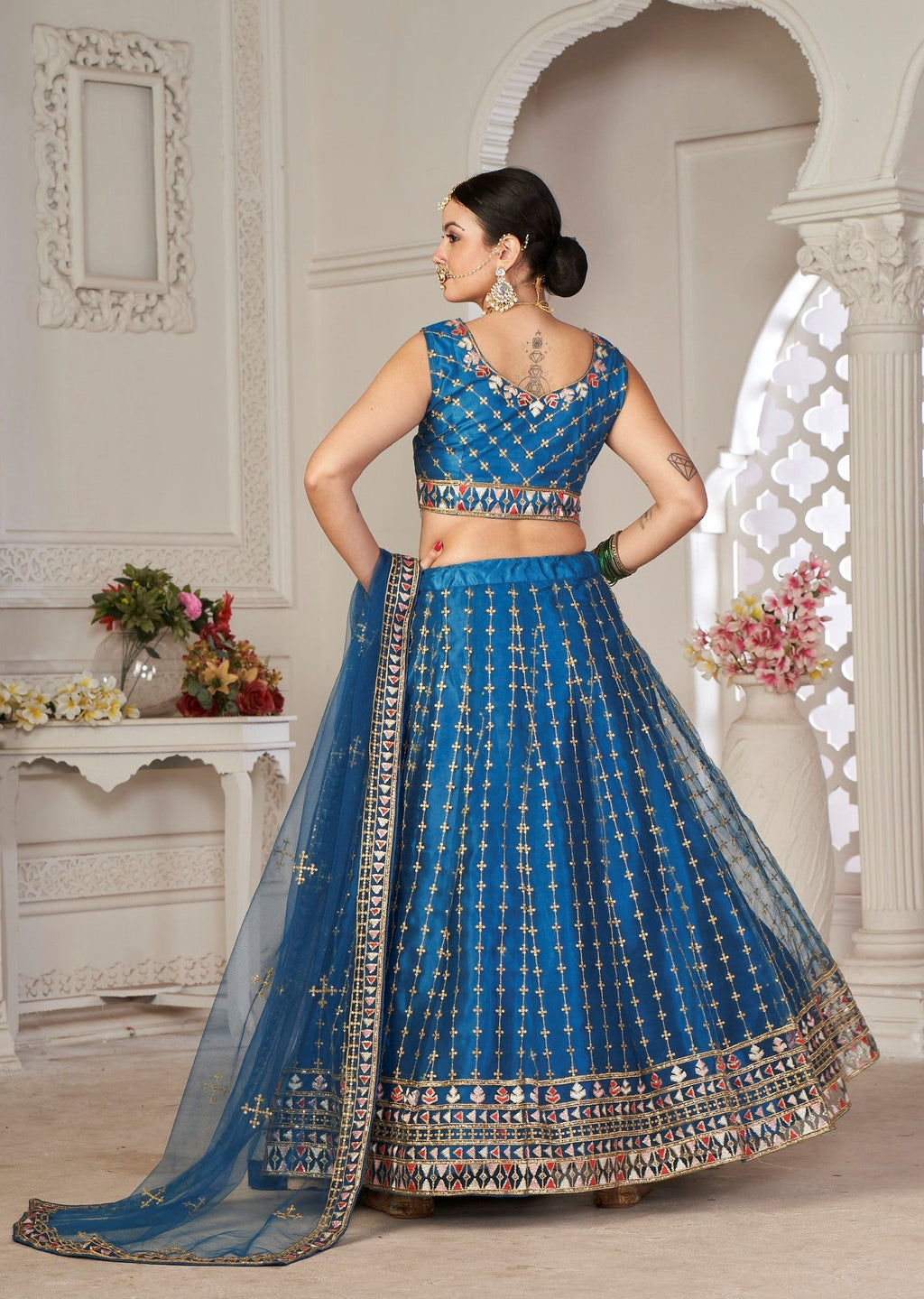 Graceful Teal Blue Embroidered Festive & Wedding Wear Semi-Stitched Net Lehenga Choli with Net Dupatta