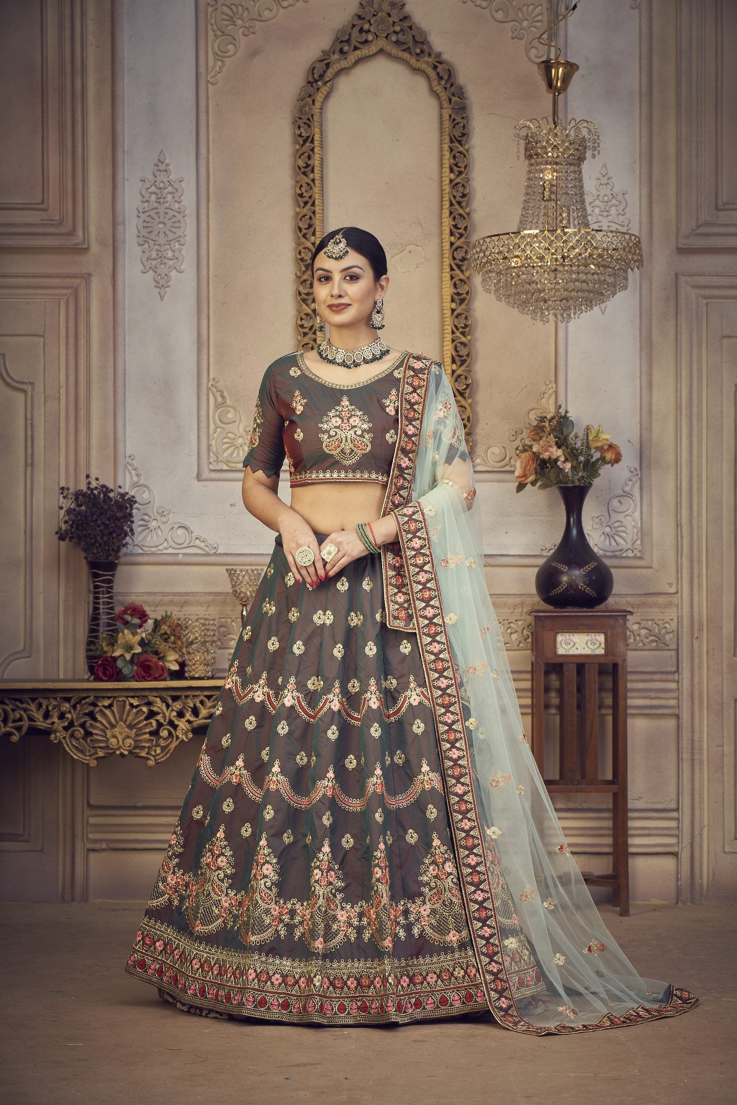 Elegant Bottle Green Embroidered Festive & Wedding Wear Semi-Stitched Silk Lehenga Choli with Soft Net Dupatta
