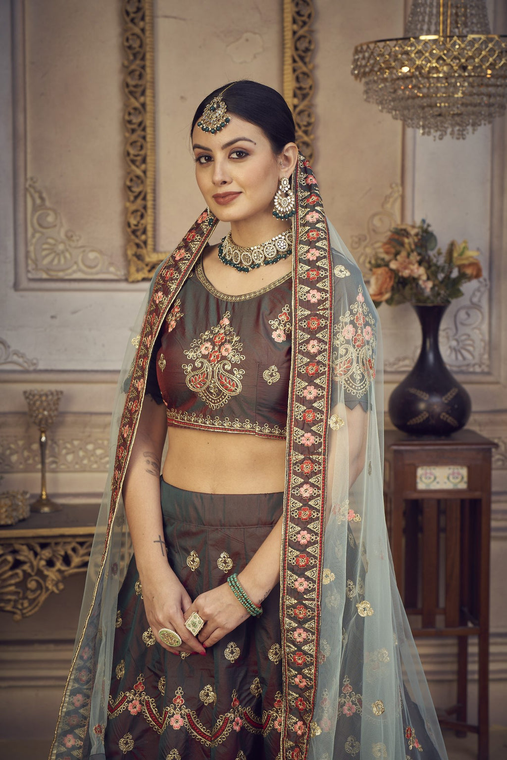 Elegant Bottle Green Embroidered Festive & Wedding Wear Semi-Stitched Silk Lehenga Choli with Soft Net Dupatta
