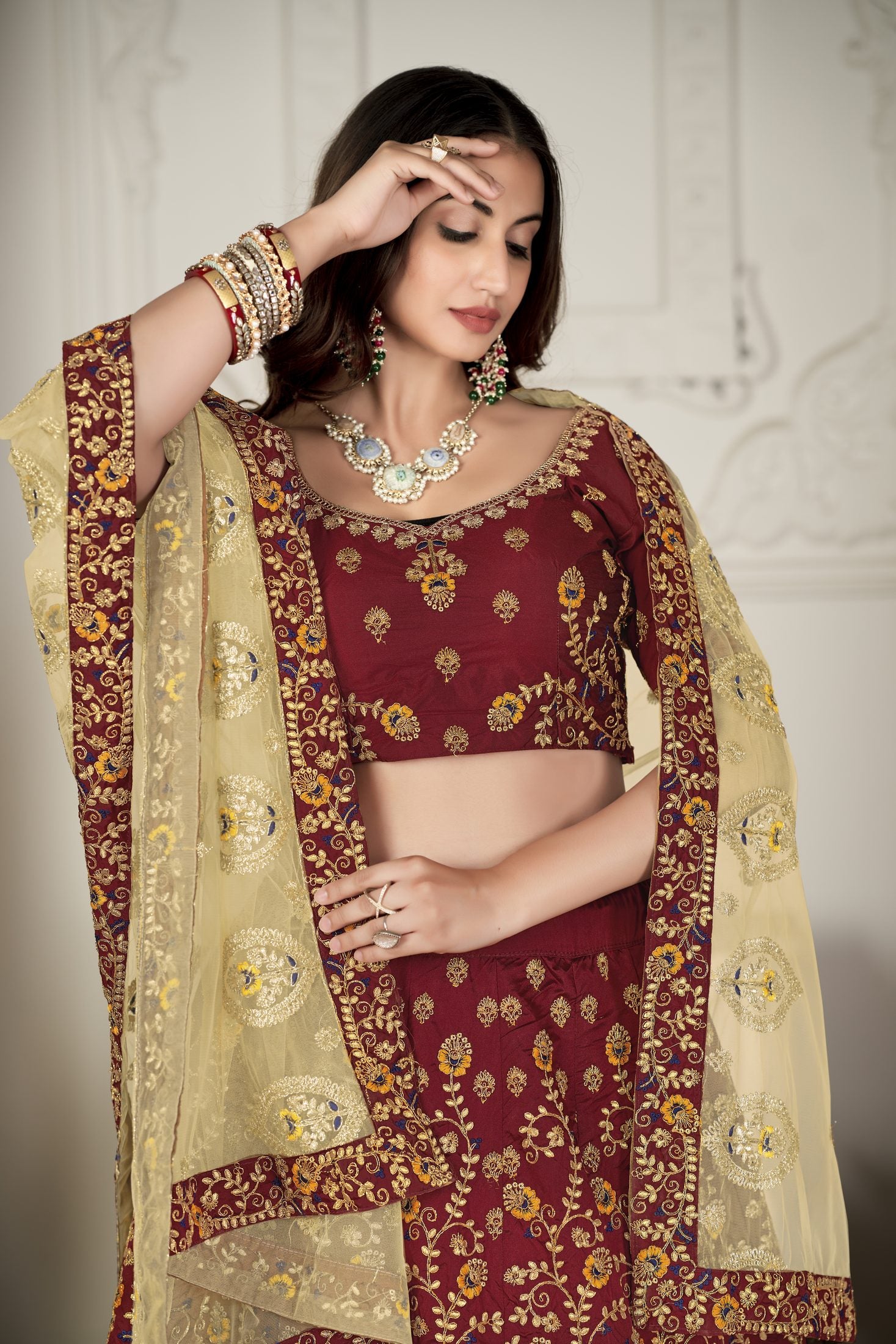 Royal Maroon Embroidered Festive & Wedding Wear Semi-Stitched Silk Lehenga Choli with Net Dupatta