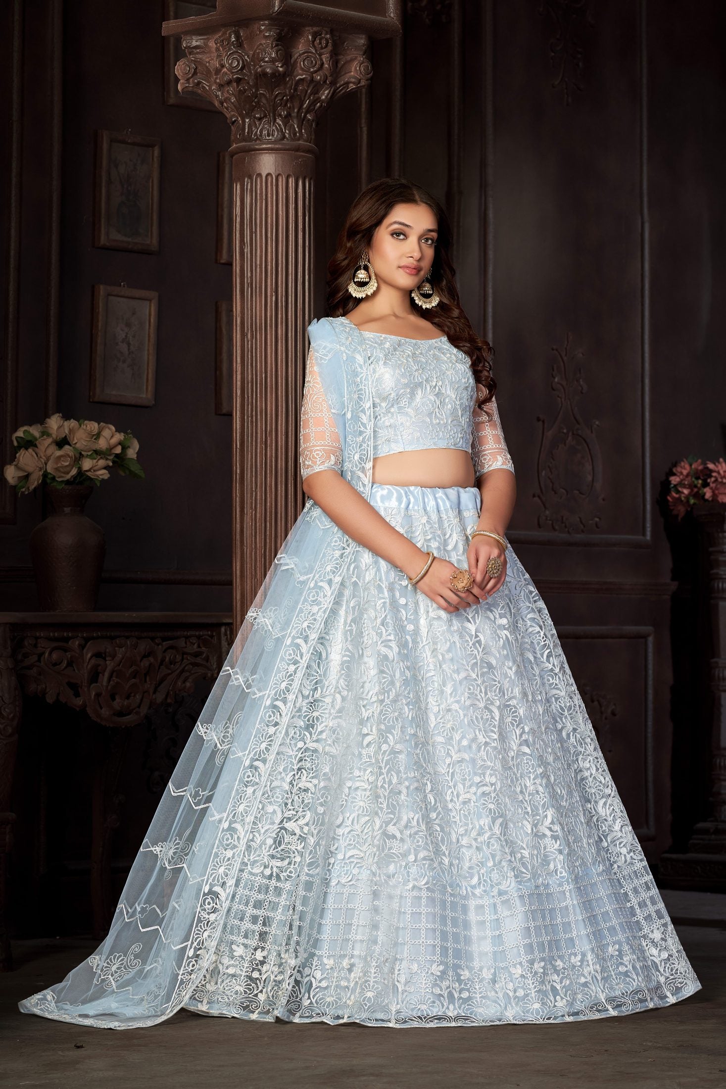 Elegant Ice Blue Thread Embroidered Wedding Wear Semi-Stitched Net Lehenga Choli with Designer Sheer Sleeve Work
