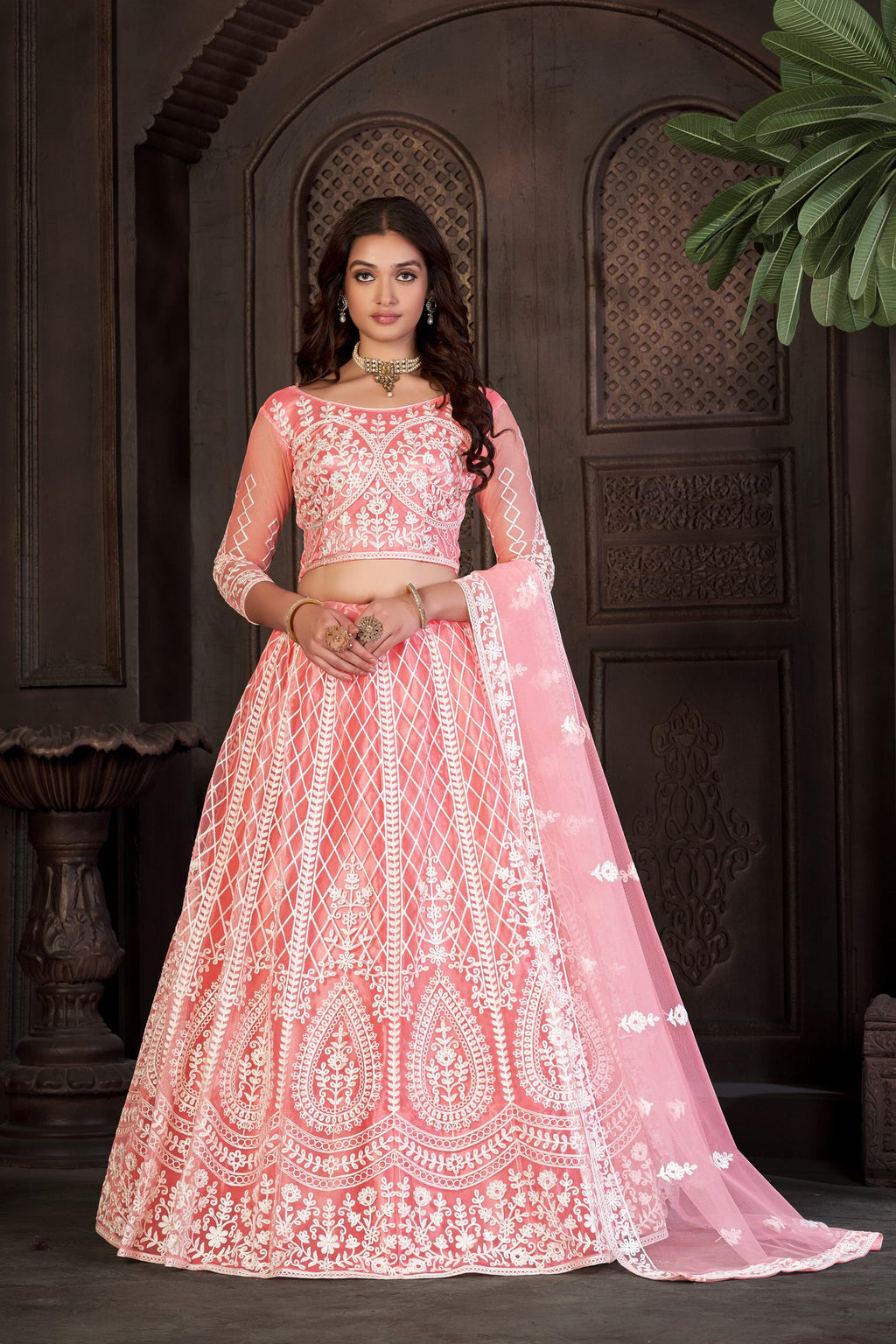 Peach Festive & Wedding Wear Semi-Stitched Net Lehenga Choli with Heavy Floral & Geometric Thread Embroidery Work