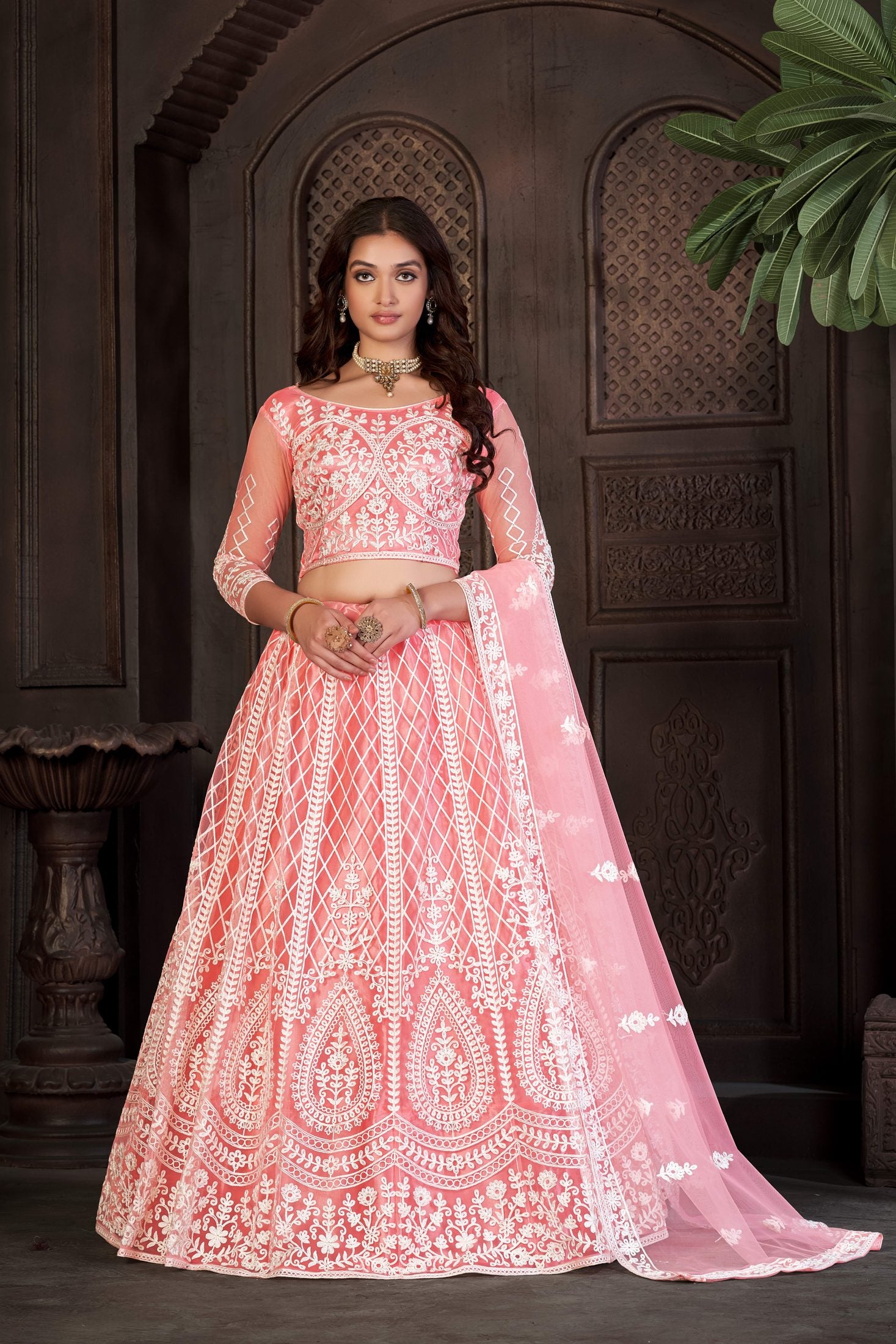 Peach Festive & Wedding Wear Semi-Stitched Net Lehenga Choli with Heavy Floral & Geometric Thread Embroidery Work