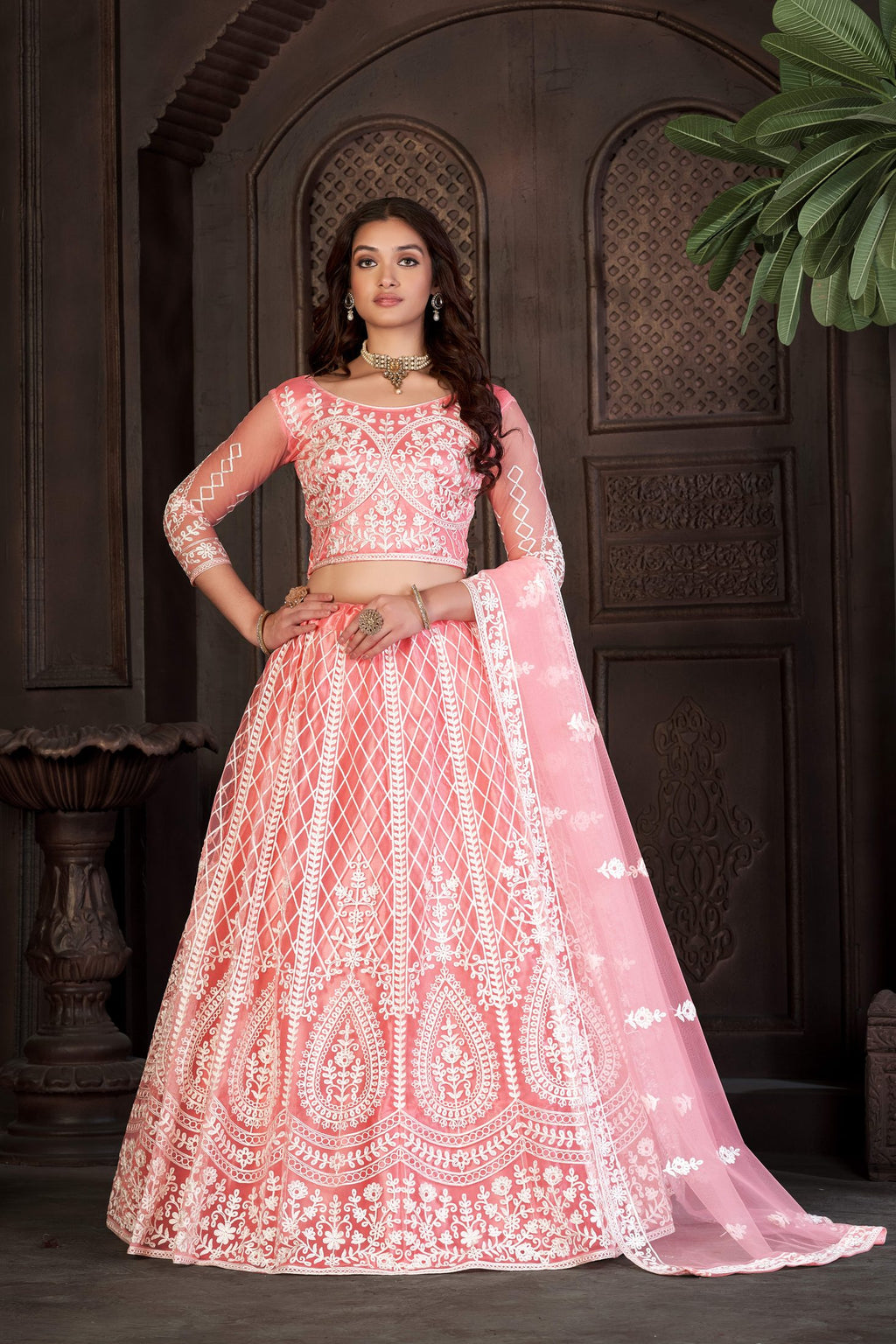 Peach Festive & Wedding Wear Semi-Stitched Net Lehenga Choli with Heavy Floral & Geometric Thread Embroidery Work