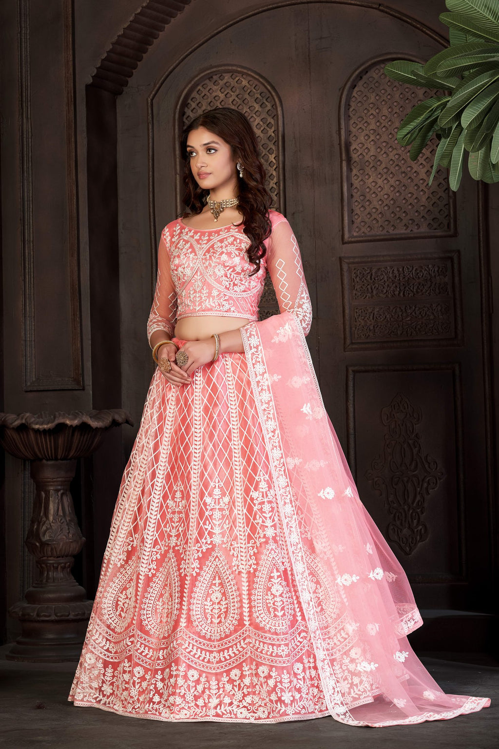 Peach Festive & Wedding Wear Semi-Stitched Net Lehenga Choli with Heavy Floral & Geometric Thread Embroidery Work