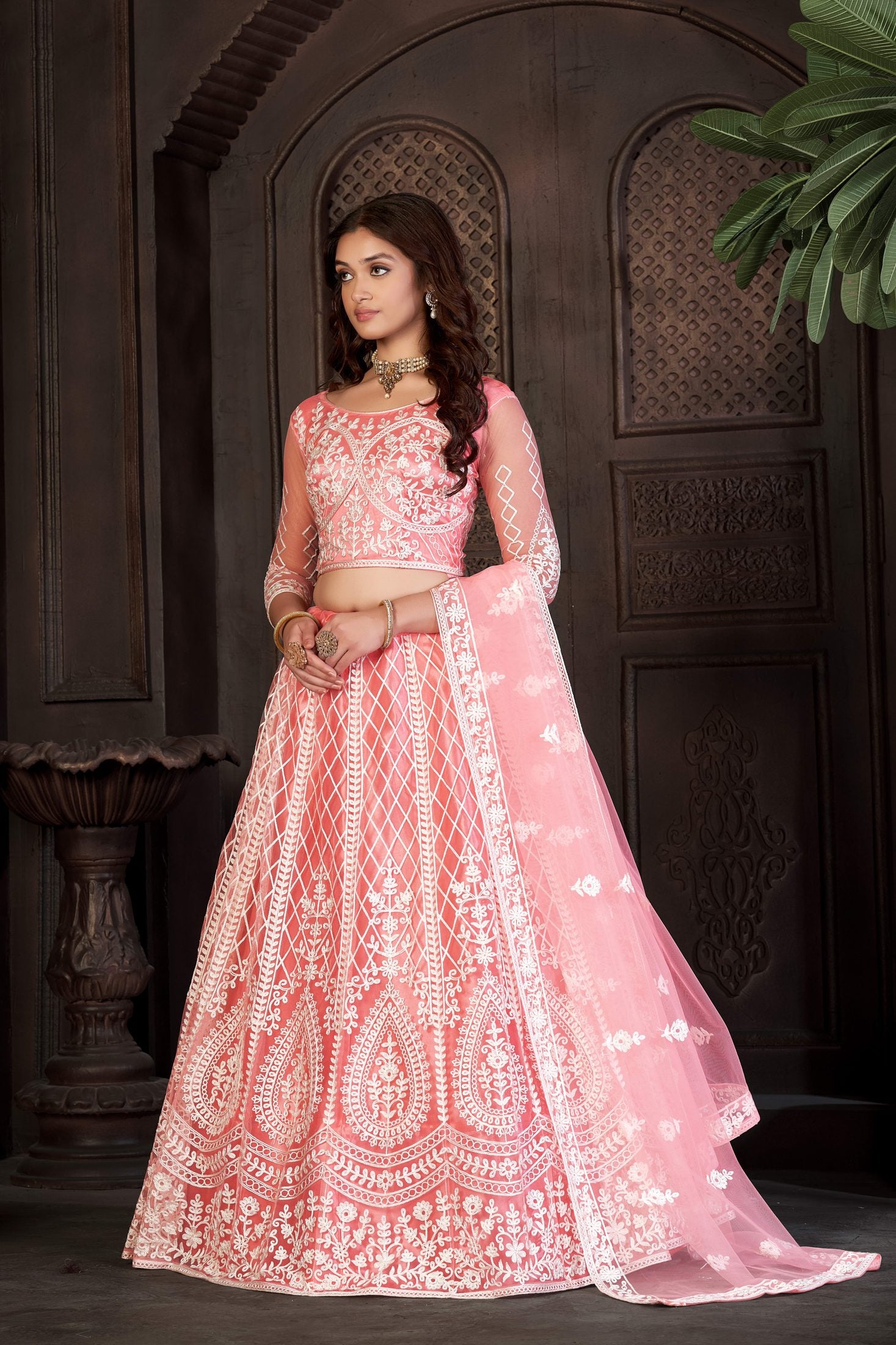 Peach Festive & Wedding Wear Semi-Stitched Net Lehenga Choli with Heavy Floral & Geometric Thread Embroidery Work