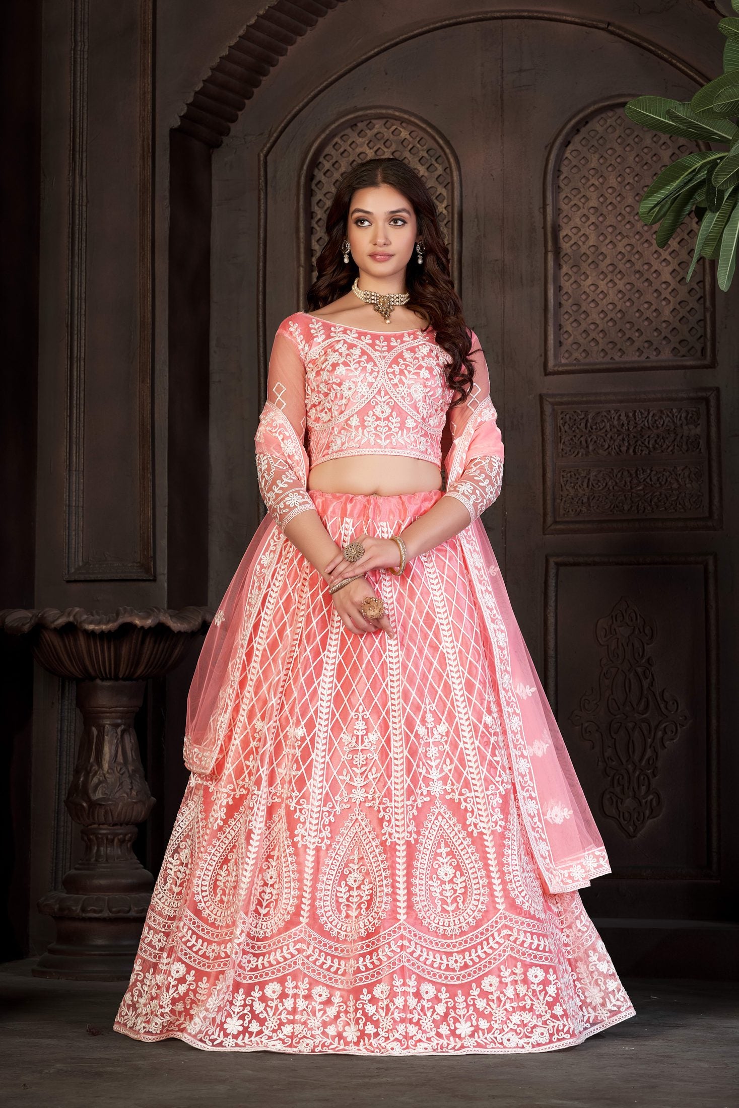Peach Festive & Wedding Wear Semi-Stitched Net Lehenga Choli with Heavy Floral & Geometric Thread Embroidery Work