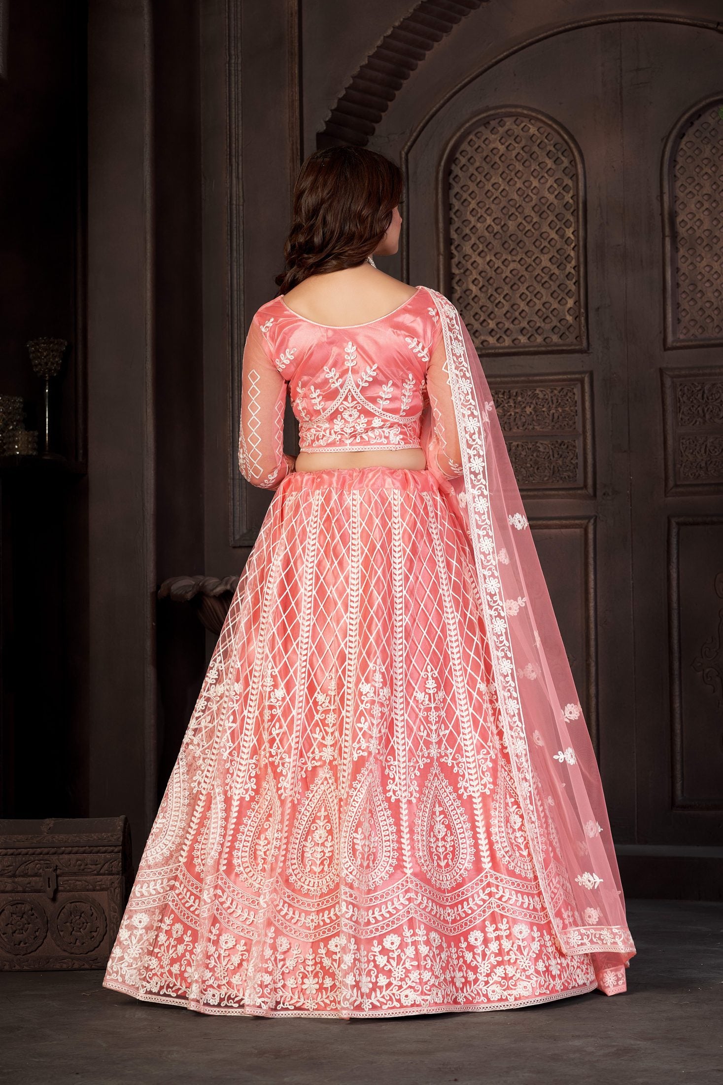 Peach Festive & Wedding Wear Semi-Stitched Net Lehenga Choli with Heavy Floral & Geometric Thread Embroidery Work