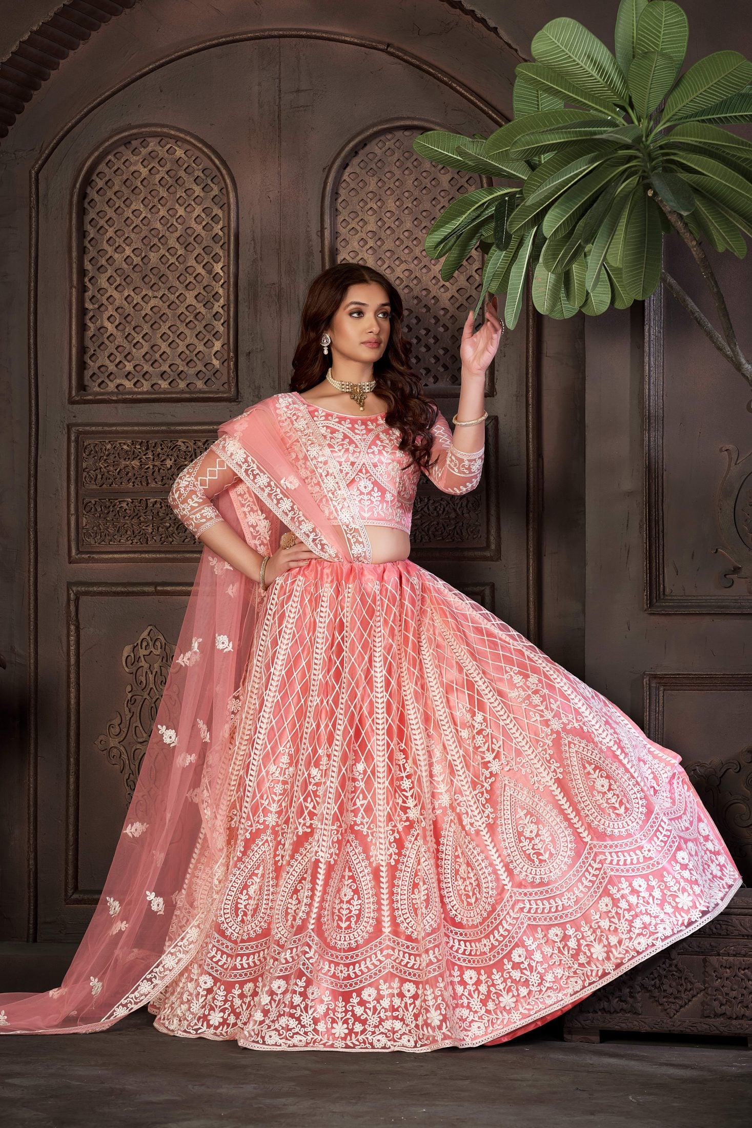 Peach Festive & Wedding Wear Semi-Stitched Net Lehenga Choli with Heavy Floral & Geometric Thread Embroidery Work