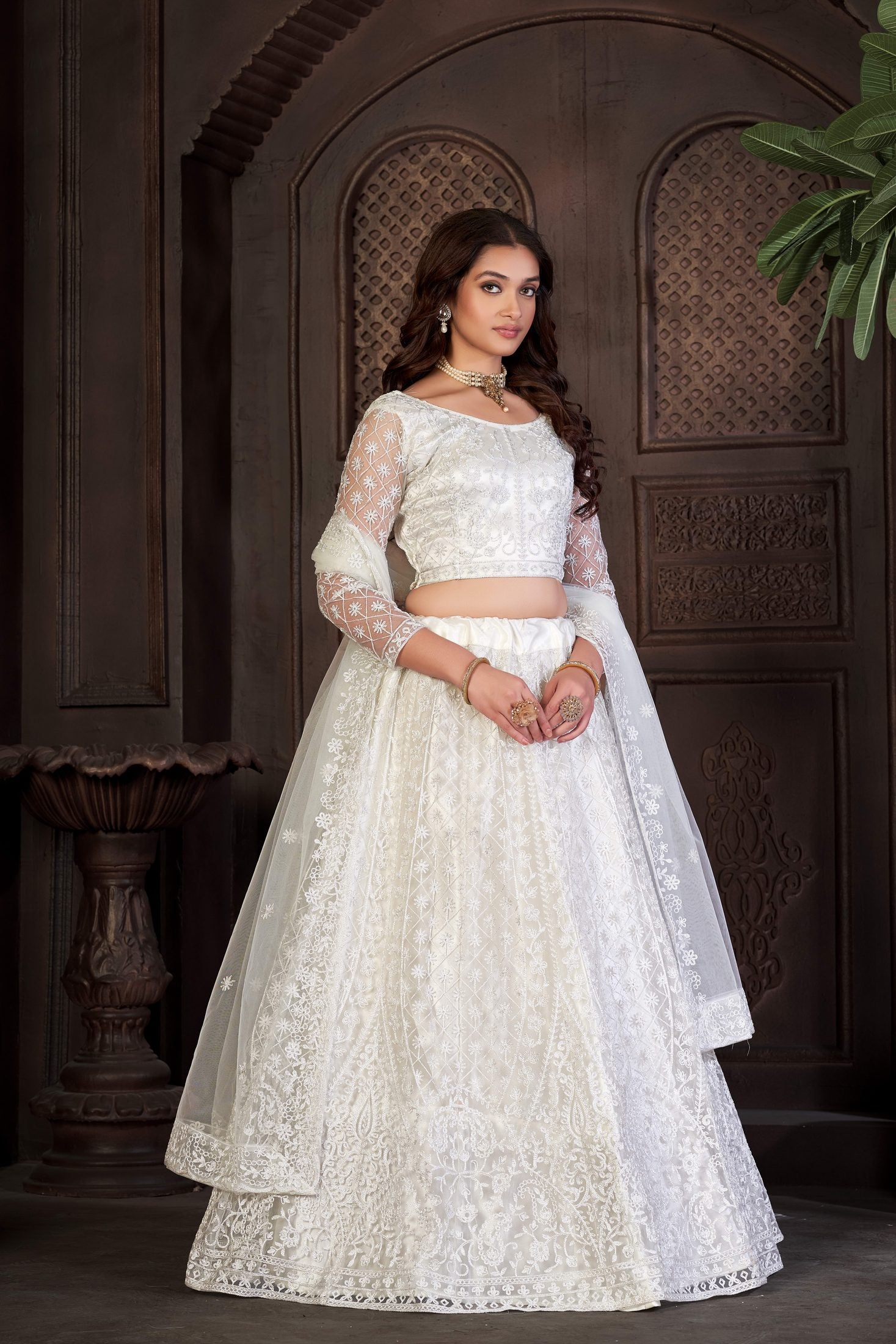 Elegant Off-White Bridal & Wedding Wear Semi-Stitched Net Lehenga Choli with Intricate Floral Thread Embroidery Work
