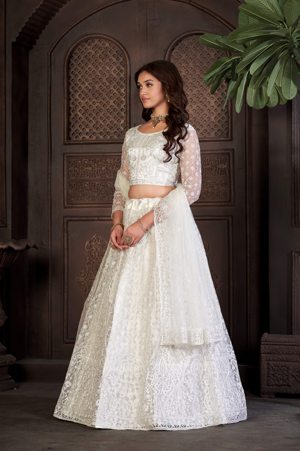 Elegant Off-White Bridal & Wedding Wear Semi-Stitched Net Lehenga Choli with Intricate Floral Thread Embroidery Work