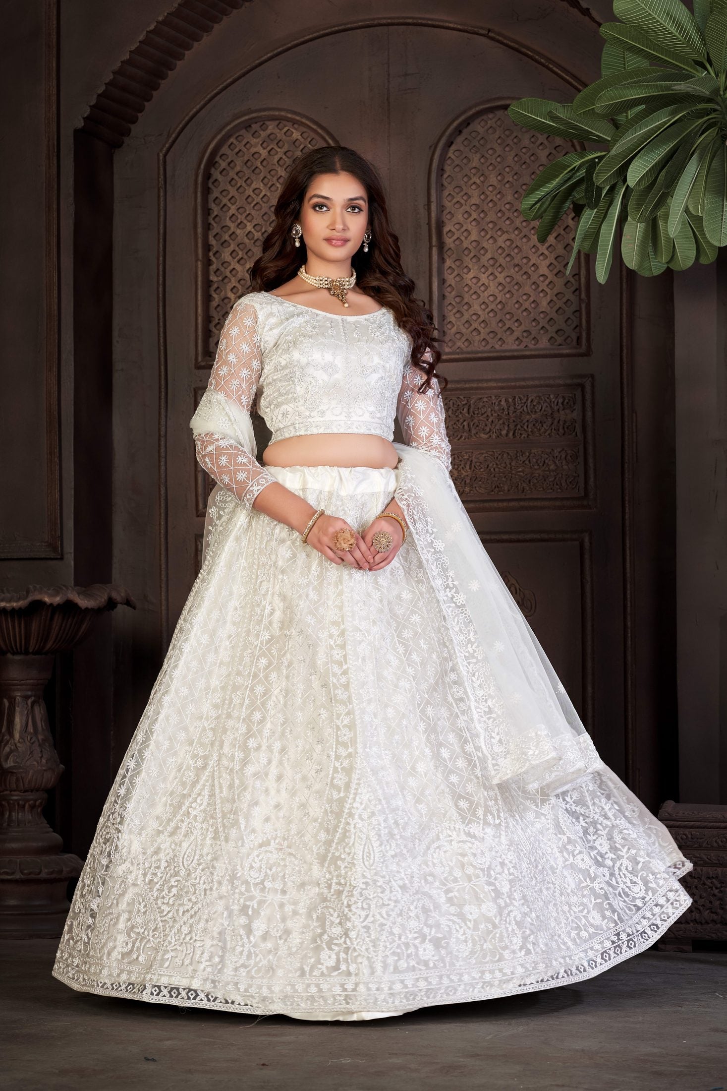 Elegant Off-White Bridal & Wedding Wear Semi-Stitched Net Lehenga Choli with Intricate Floral Thread Embroidery Work