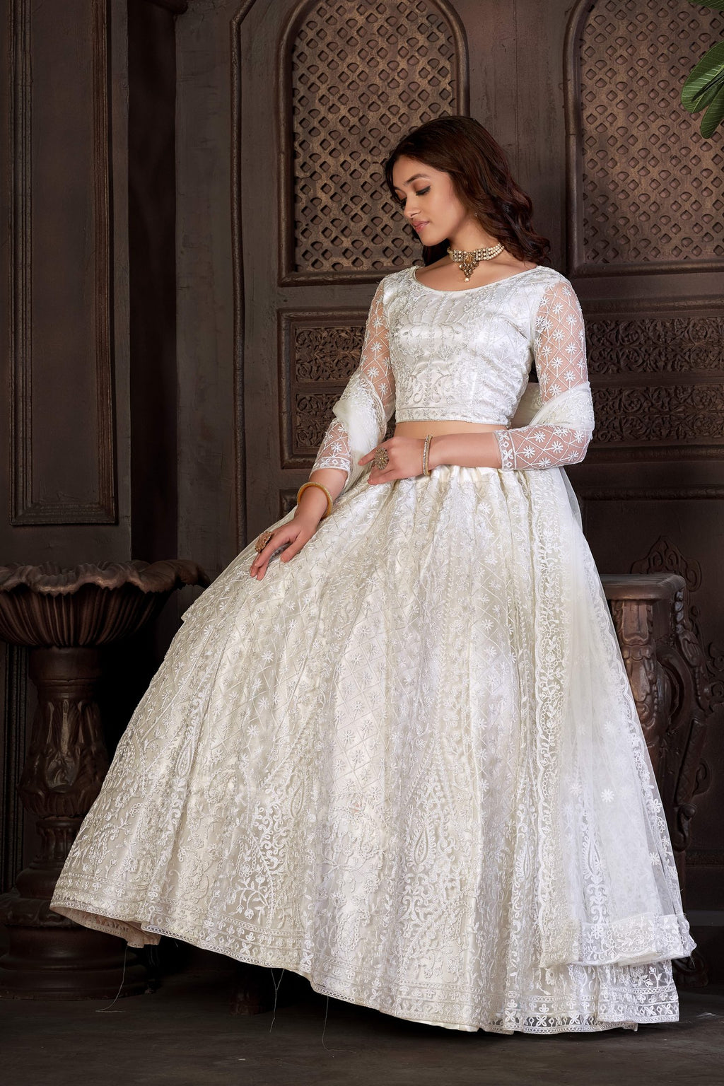 Elegant Off-White Bridal & Wedding Wear Semi-Stitched Net Lehenga Choli with Intricate Floral Thread Embroidery Work