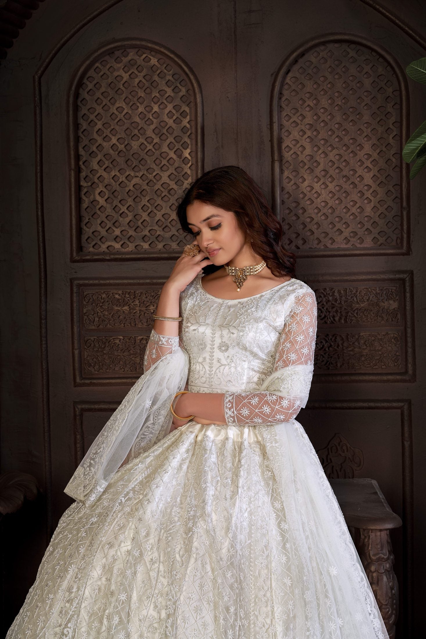 Elegant Off-White Bridal & Wedding Wear Semi-Stitched Net Lehenga Choli with Intricate Floral Thread Embroidery Work