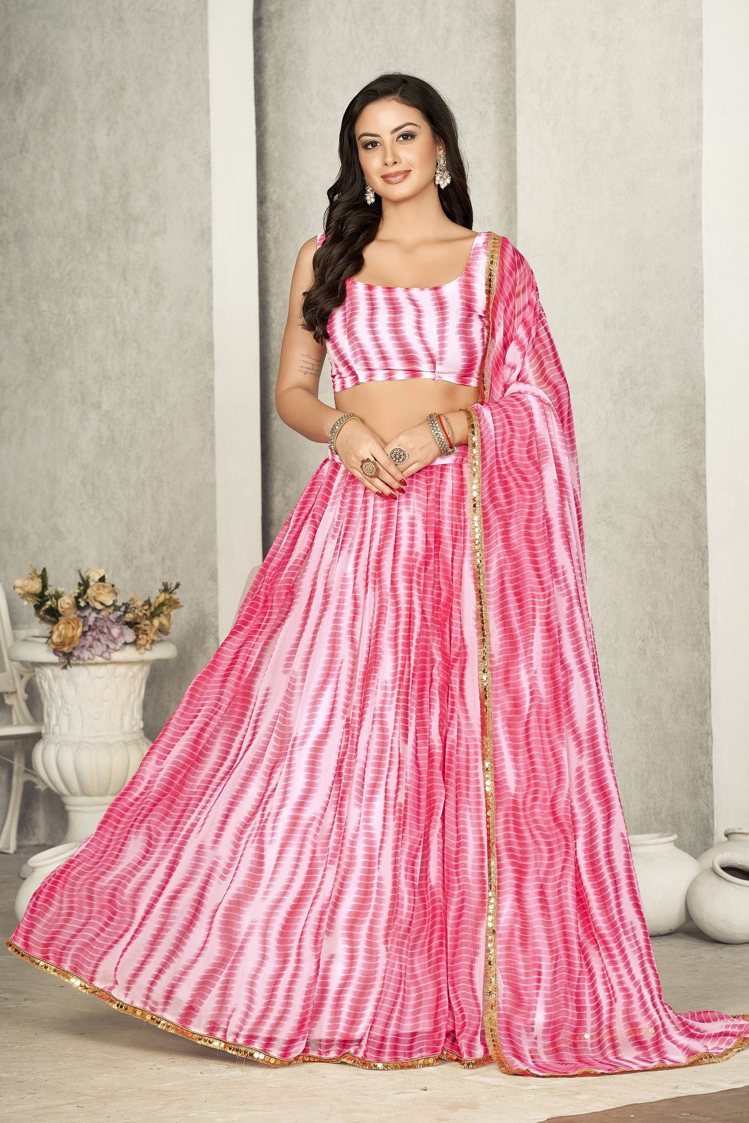 Elegant Rani Pink Leheriya Printed Festive & Wedding Wear Semi-Stitched Georgette Lehenga Choli with Golden Lace Border Dupatta Work