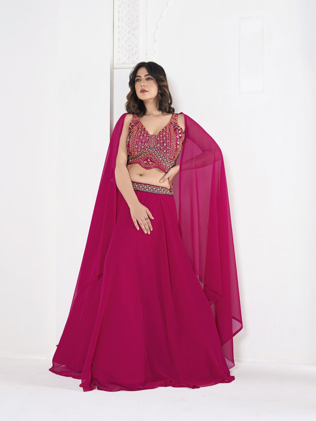 Rani Pink Thread Embroidered Festive & Wedding Wear Semi-Stitched Georgette Lehenga Choli with Cape Dupatta