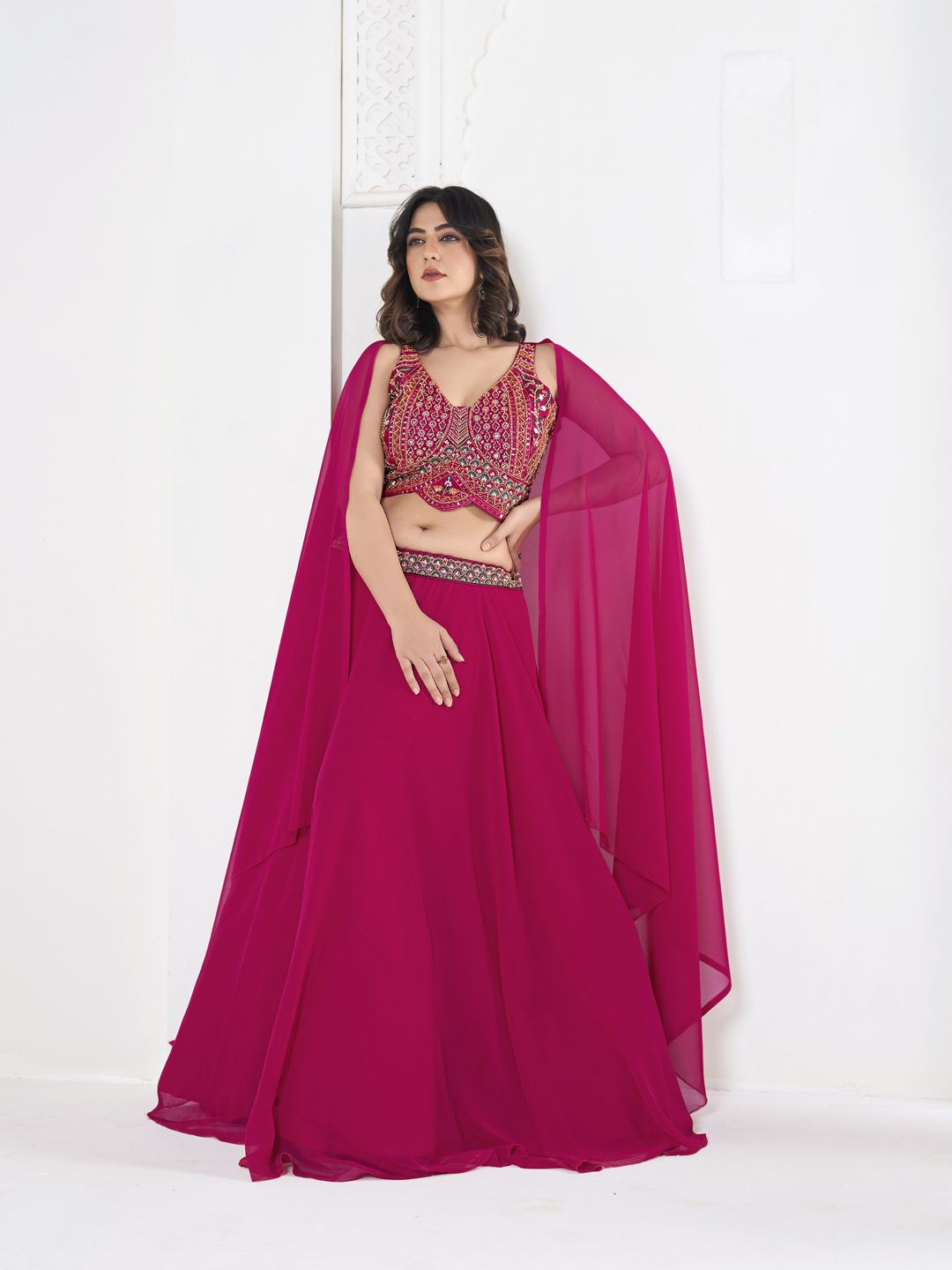 Rani Pink Thread Embroidered Festive & Wedding Wear Semi-Stitched Georgette Lehenga Choli with Cape Dupatta