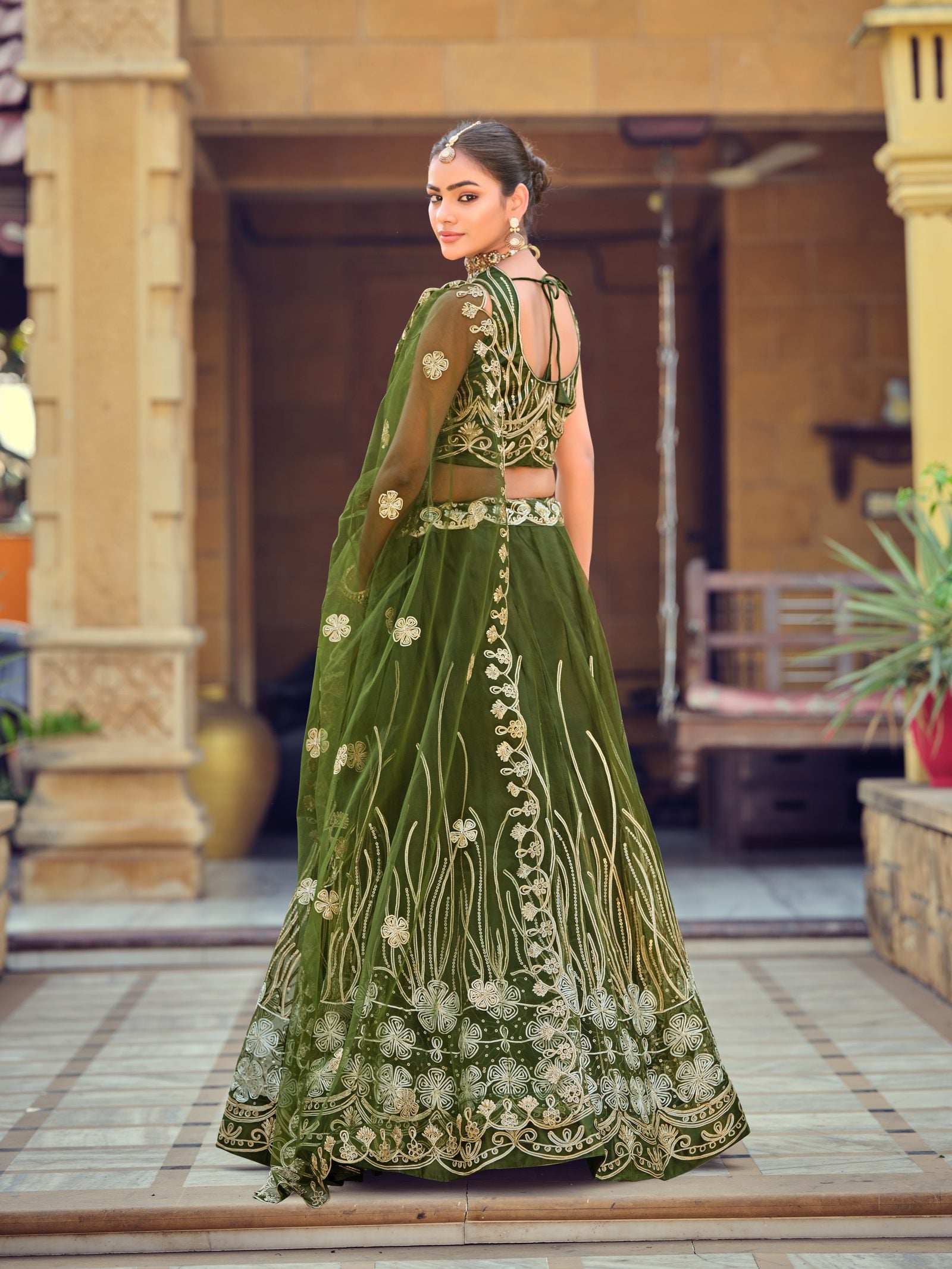 Dark Green Zari & Thread Embroidered Wedding Wear Semi-Stitched Net Lehenga Choli with Heavy Border Work