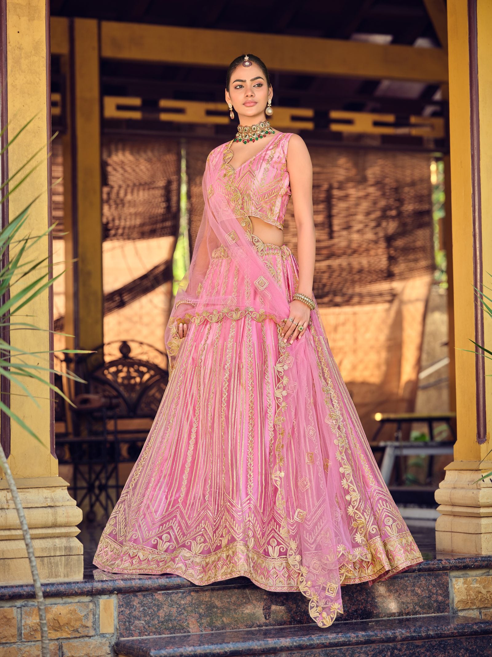 Pink Zari Embroidered Festive & Wedding Wear Semi-Stitched Net Lehenga Choli with Heavy Border Work