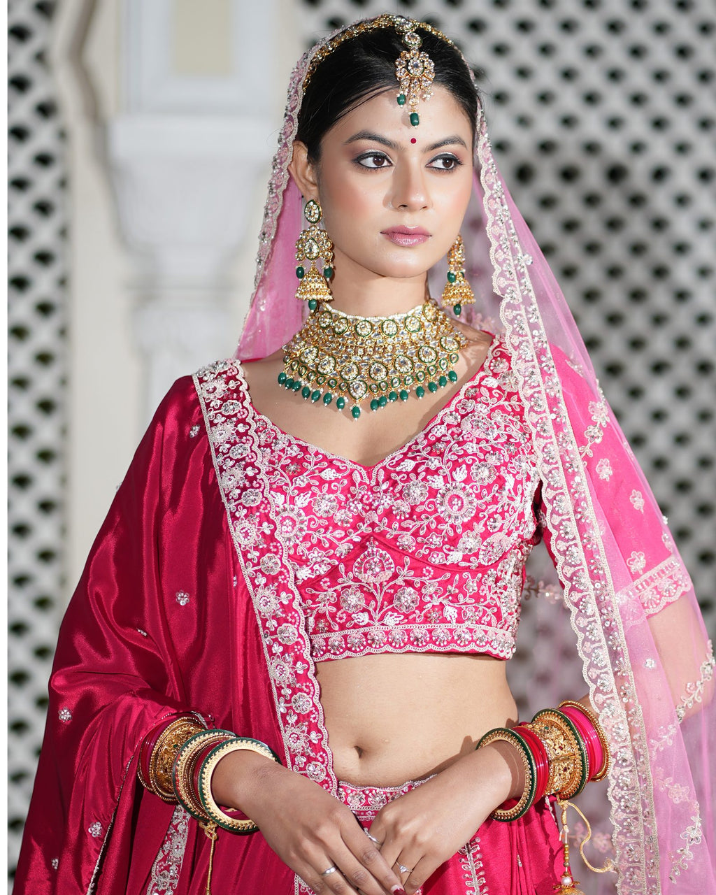 Motif Pattern Embroidered Semi- Sticth Rani Pink Silk Bridal Lehenga Choli with Net Dupatta