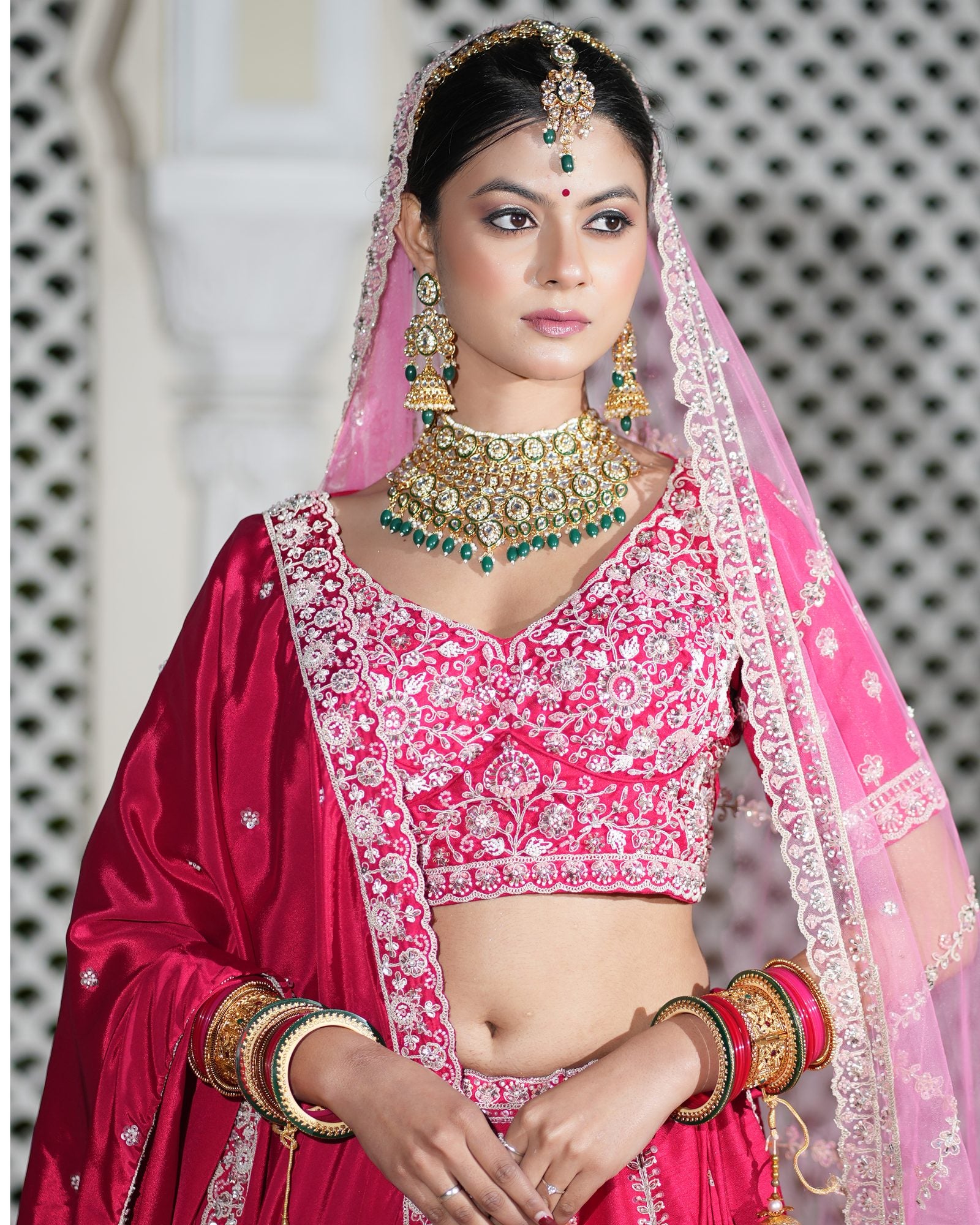 Motif Pattern Embroidered Semi- Sticth Rani Pink Silk Bridal Lehenga Choli with Net Dupatta