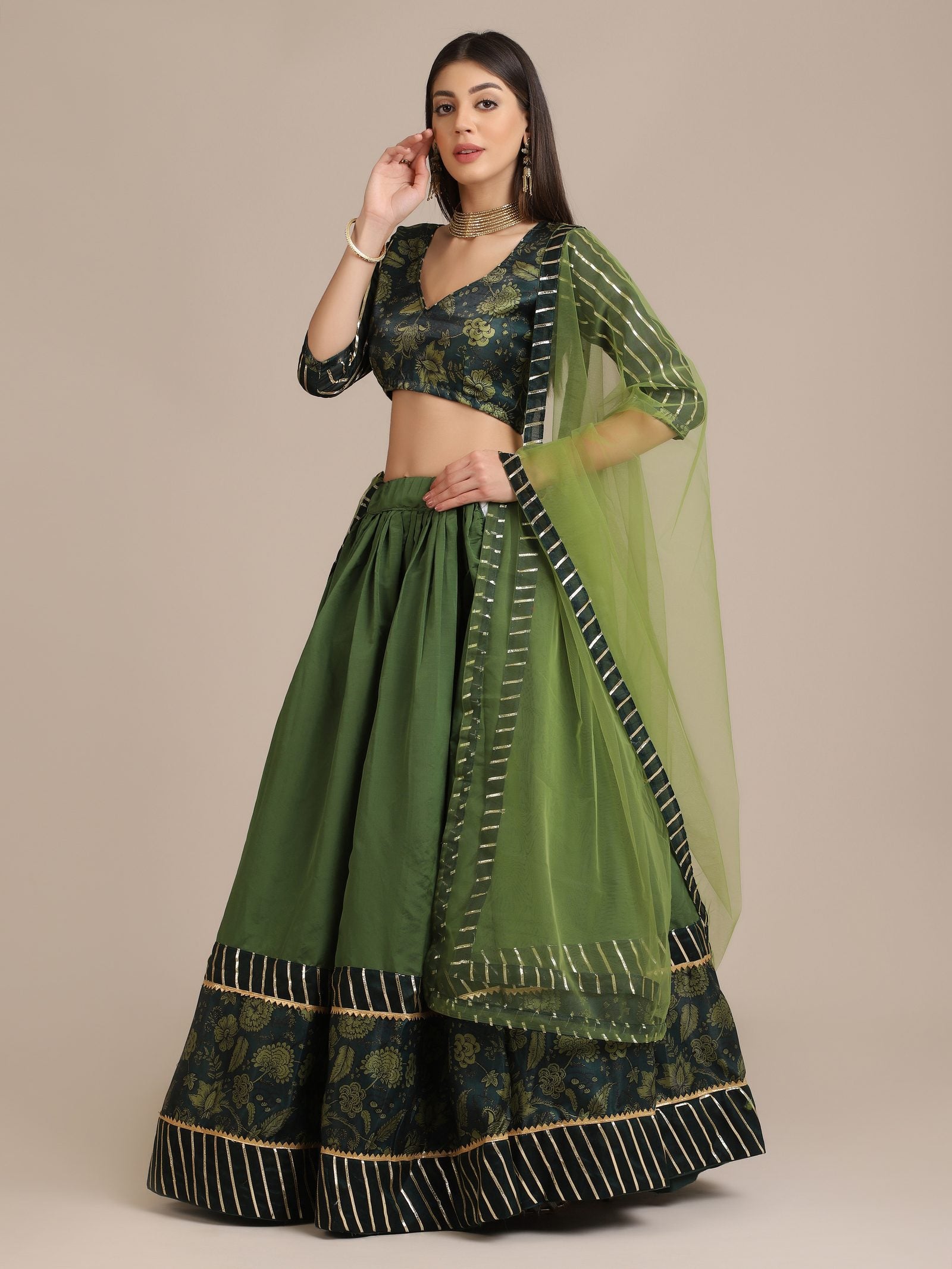 Elegant Bottle Green Wedding Wear Semi-Stitched Silk Lehenga Choli with Floral Brocade Pattern with Striped Border Work