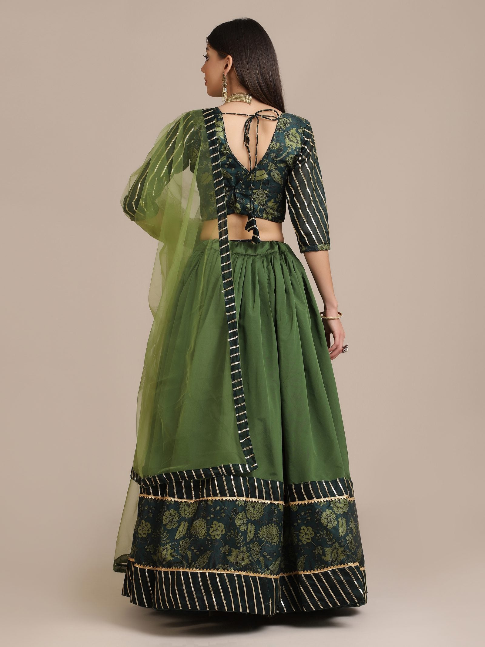Elegant Bottle Green Wedding Wear Semi-Stitched Silk Lehenga Choli with Floral Brocade Pattern with Striped Border Work