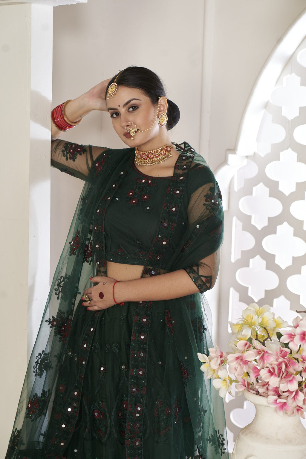 Elegant Emerald Green Party & Wedding Wear Semi-Stitched Net Lehenga Choli with Floral Embroidered Embellished Work